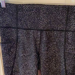 Athleta stash pocket salutation tights